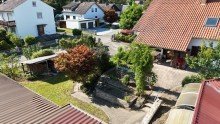 Luftbild **Nach 10 Wochen verkauft!** Gro�z�giges Ein-Zweifamilienhaus mit sonnigem Garten und vier Garagen!